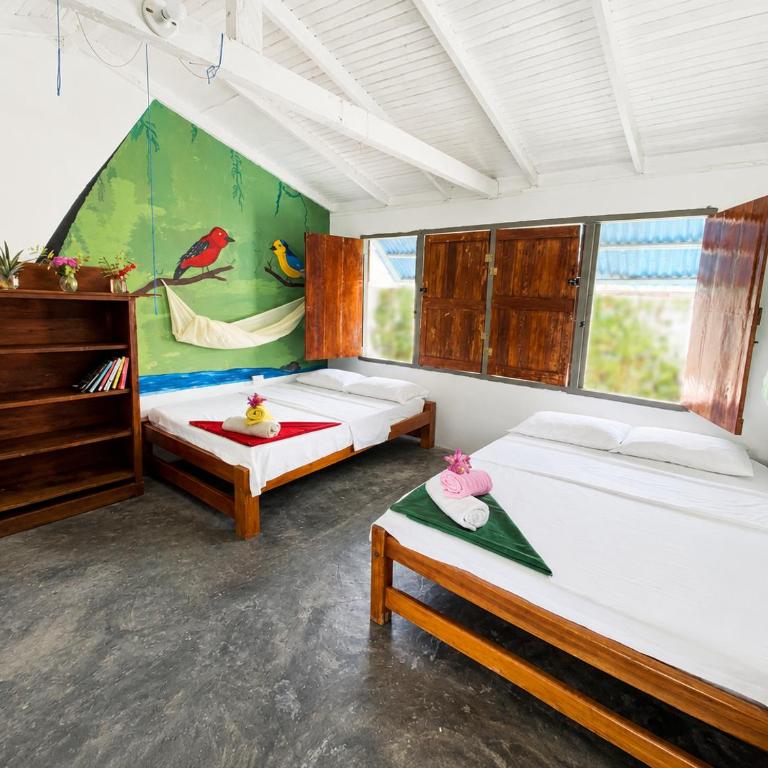 Cabañas Los Almendros - Habitación Triple con vistas al jardín - 2