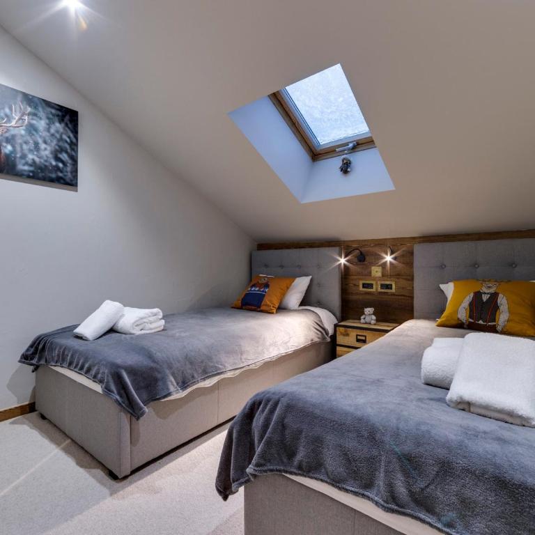Appartement skis aux pieds Arc 1950 avec Wi-Fi et bien-être - Three-Bedroom Apartment - 17