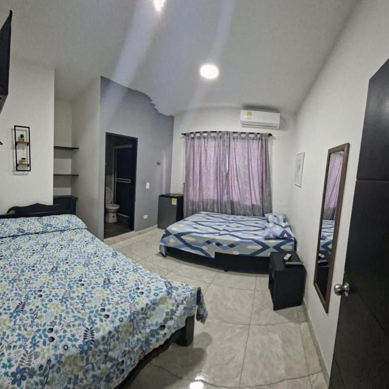 Hostal Mi Puerto - Habitación Cuádruple Clásica - 2