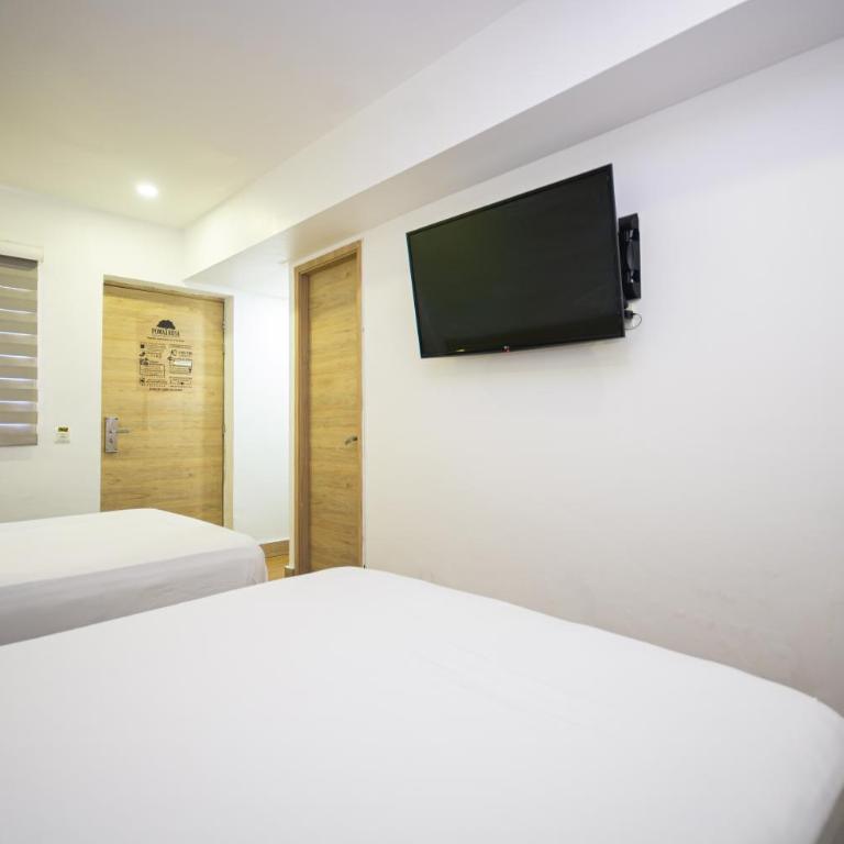 Hotel Poma Rosa Boutique Laureles - Standard Quadruple Room - 7