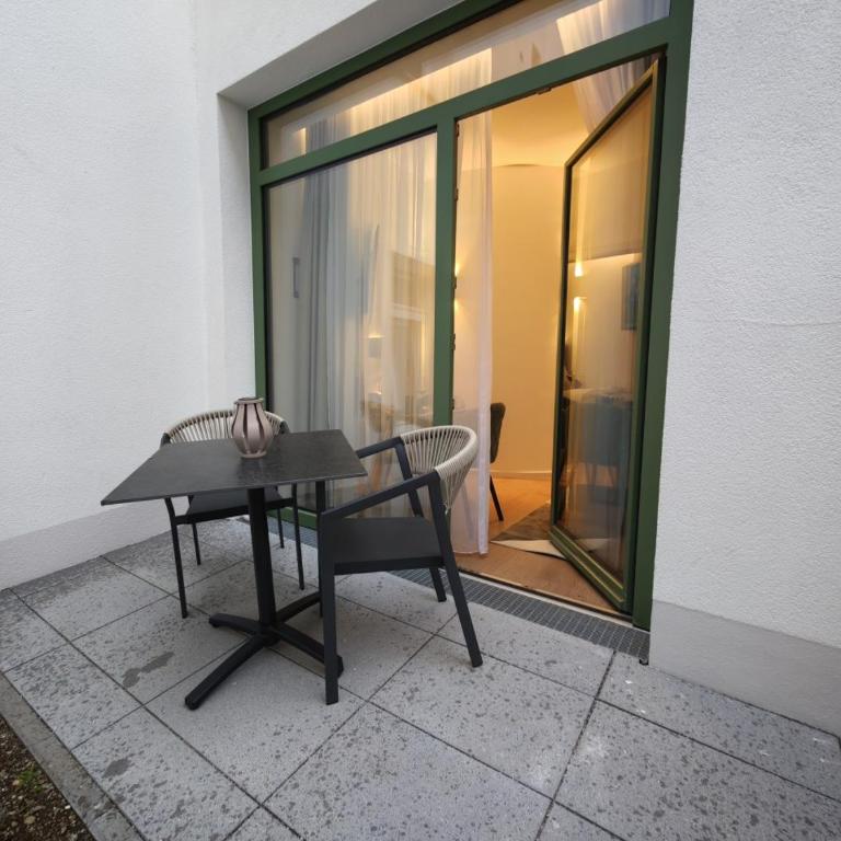 Homely Stay City Apartments - Apartment mit 1 Schlafzimmer und Terrasse - 7