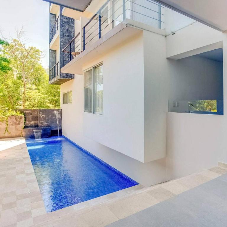 Oceanview Condo W Rooftop Plunge Pool - Three-Bedroom Apartment with Balcony - 33