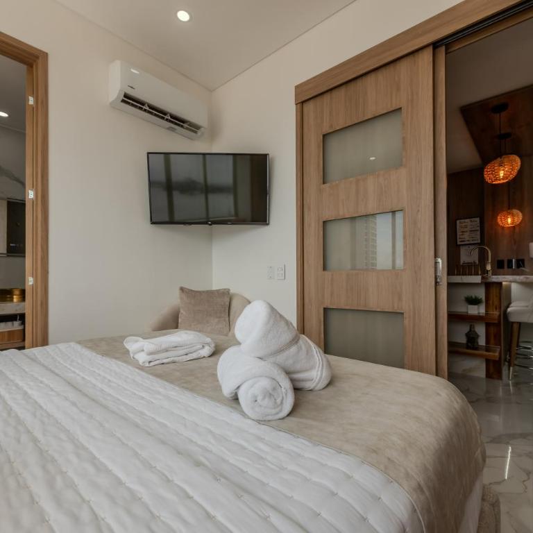 Sand Whisper Infinito Inn Bocagrande Cartagena - Apartamento Deluxe de 2 dormitorios - 59