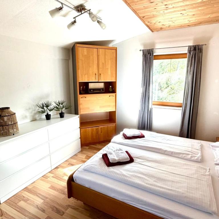 Haus Auner Top 4 - Deluxe-Apartment mit 2 Schlafzimmern und Gartenblick - 14