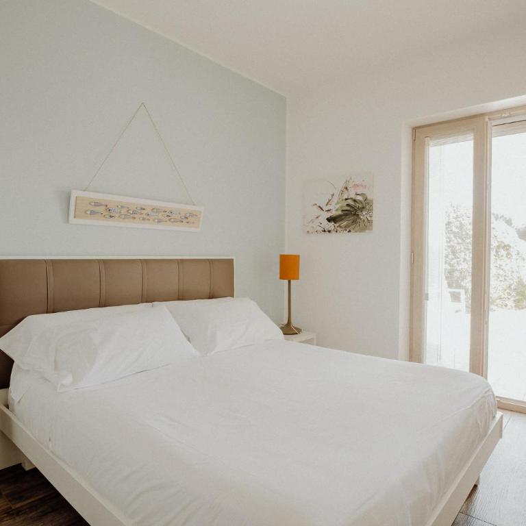Residenza Lamandia by Monholiday - Villa - 2