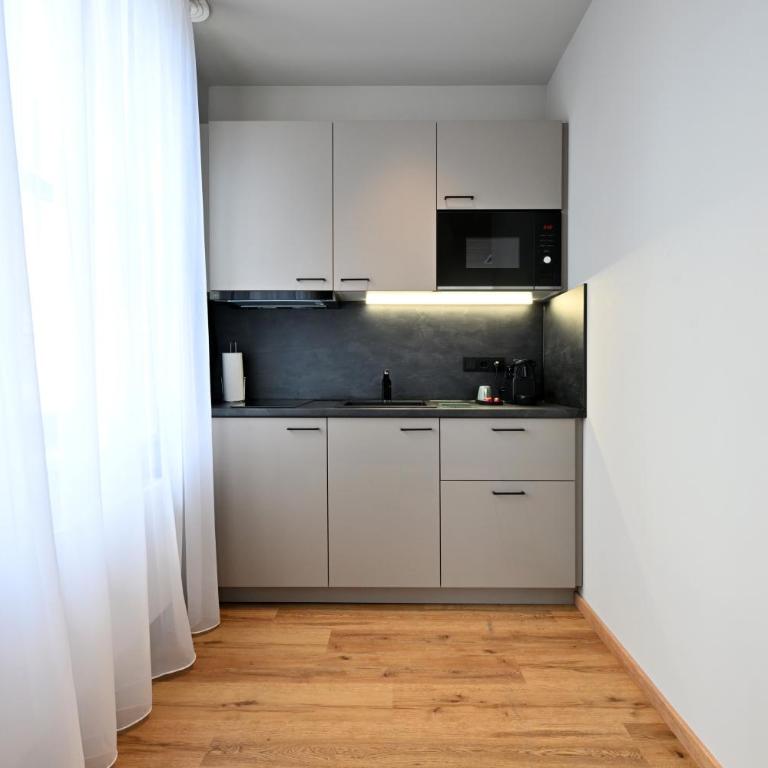 WYSE Apartments Nürnberg City, klimatisiert, vollausgestattete Kitchenette, 24h Check-in, Metro - Monolocale Triplo Standard - 7