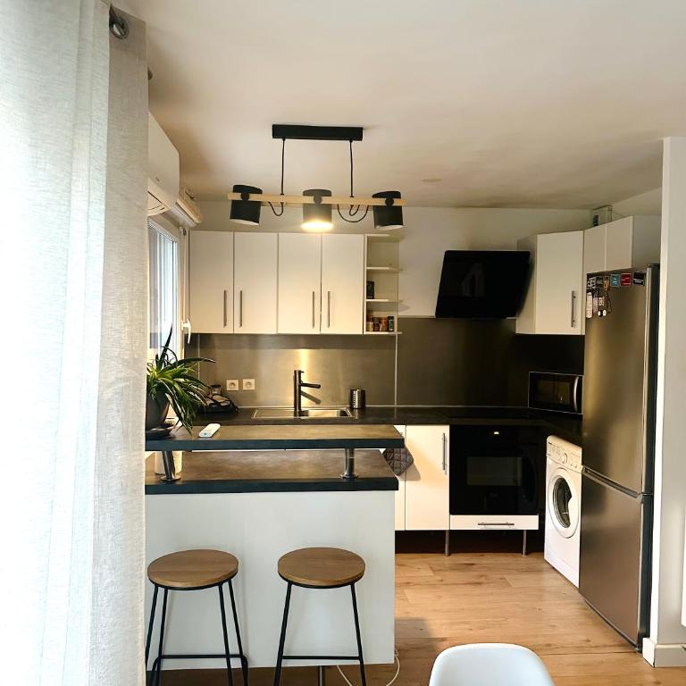 Appartement Calme avec Clim, Balcon et Parking Ovalie - Apartment mit 1 Schlafzimmer - 1