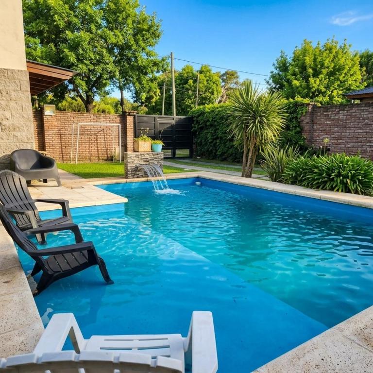 Casa con piscina y quincho, para familias - Casa de 2 dormitorios - 10