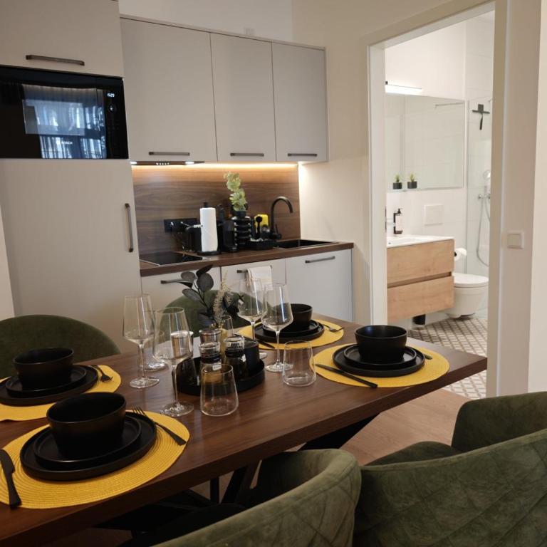 Homely Stay City Apartments - Apartment mit 1 Schlafzimmer und Terrasse - 1