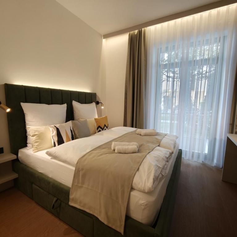 Homely Stay City Apartments - Apartment mit 1 Schlafzimmer und Terrasse - 14