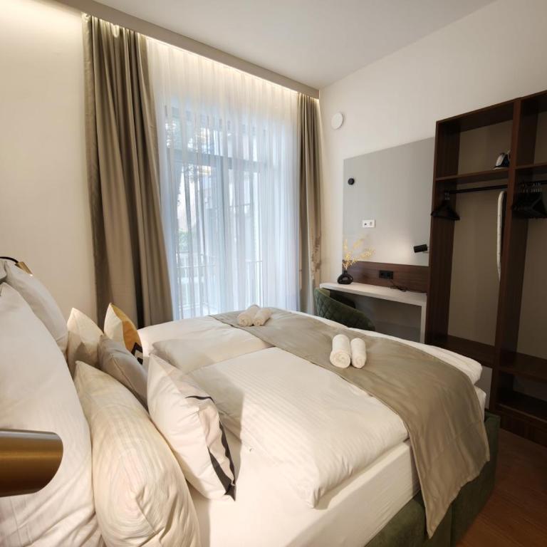 Homely Stay City Apartments - Apartment mit 1 Schlafzimmer und Terrasse - 15