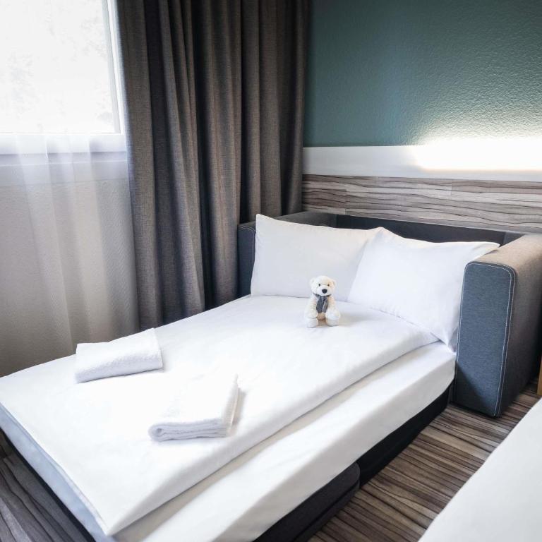Ibis Styles Linz - Familienzimmer mit Kingsize-Bett und Schlafsofa - 10