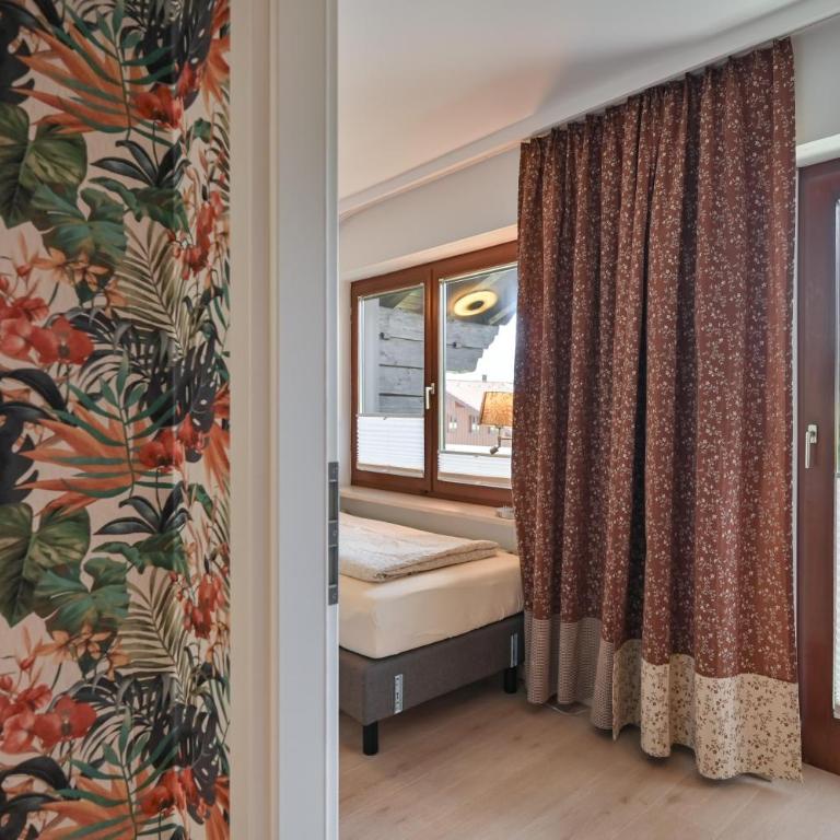 Ferienhaus AlpenVilla - mit Sauna und Sommerhörnerbahnen kostenlos - Ferienhaus - 55
