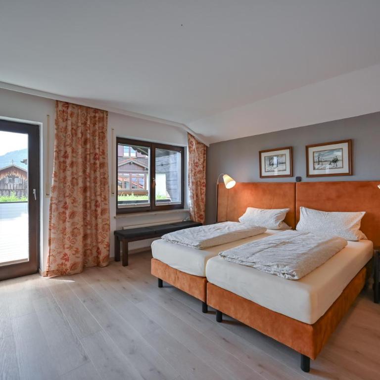 Ferienhaus AlpenVilla - mit Sauna und Sommerhörnerbahnen kostenlos - Ferienhaus - 65