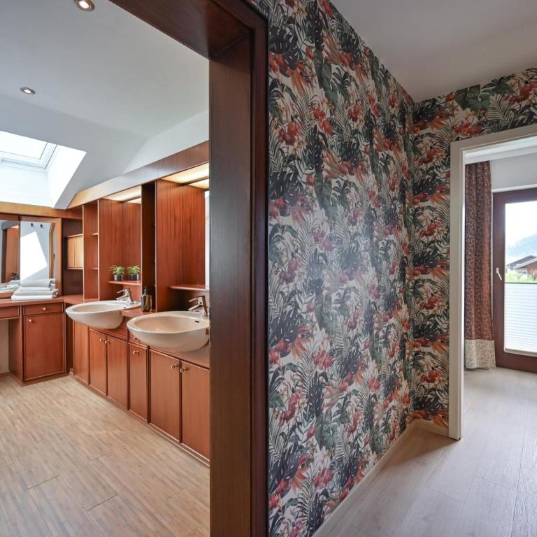 Ferienhaus AlpenVilla - mit Sauna und Sommerhörnerbahnen kostenlos - Ferienhaus - 80