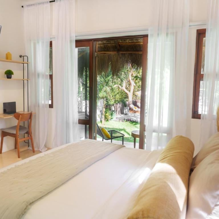 Mikasa Bacalar Hotel Boutique, Lagoon Front - Habitación con cama grande y vistas al jardín - 4