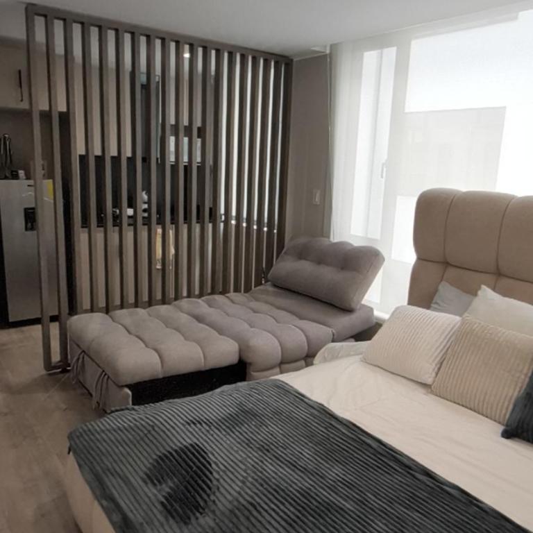 Estudio moderno con vista a la ciudad, terraza y gym A minutos del Metro La Carolina, Quito - One-Bedroom Apartment - 1