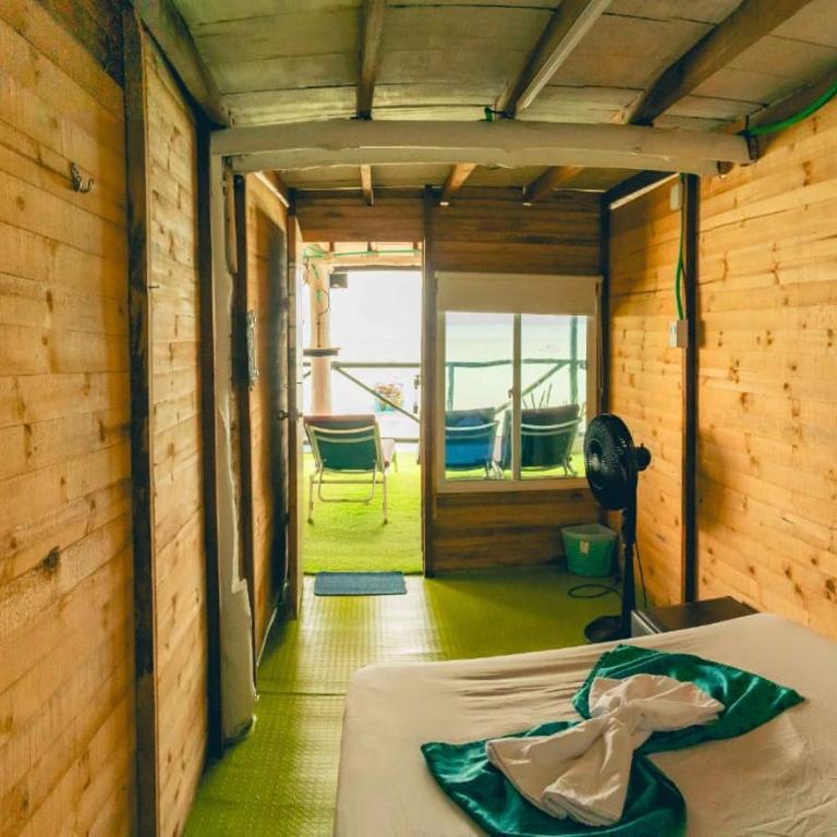 Ecohotelhector - Habitación Cuádruple con vistas al mar - 1