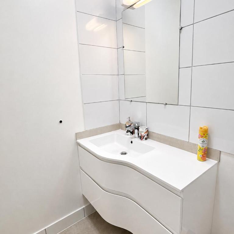 Le Clos des Baleines RDC avec jardin et 1 place de parking privée dans un garage - Appartement 1 Chambre - 19