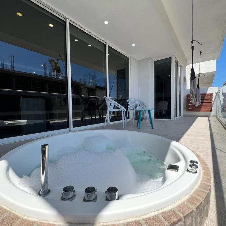 1 Dormitorio Jacuzzi privado. Vista Mar y Cienaga - Apartamento - 57