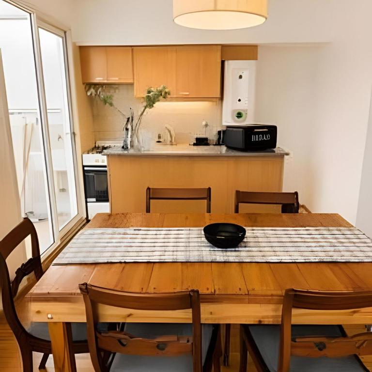 Moderno y amoblado depto. zona centro - Apartamento de 1 dormitorio - 19