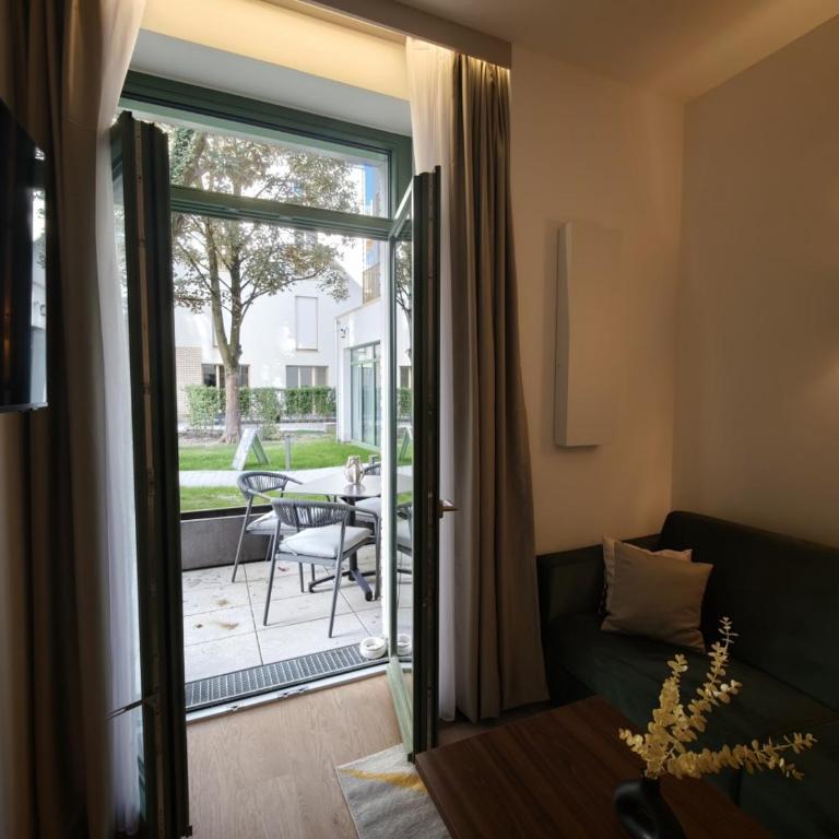Homely Stay City Apartments - Apartment mit 1 Schlafzimmer und Terrasse - 10