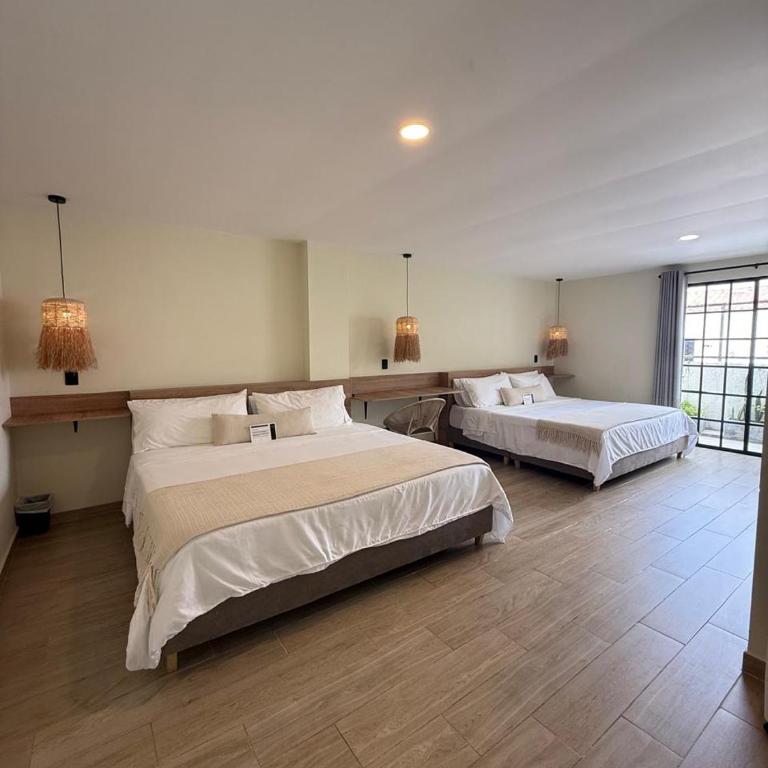 Monte Pueblo Hotel Boutique - Habitación con 2 camas extragrandes - 7