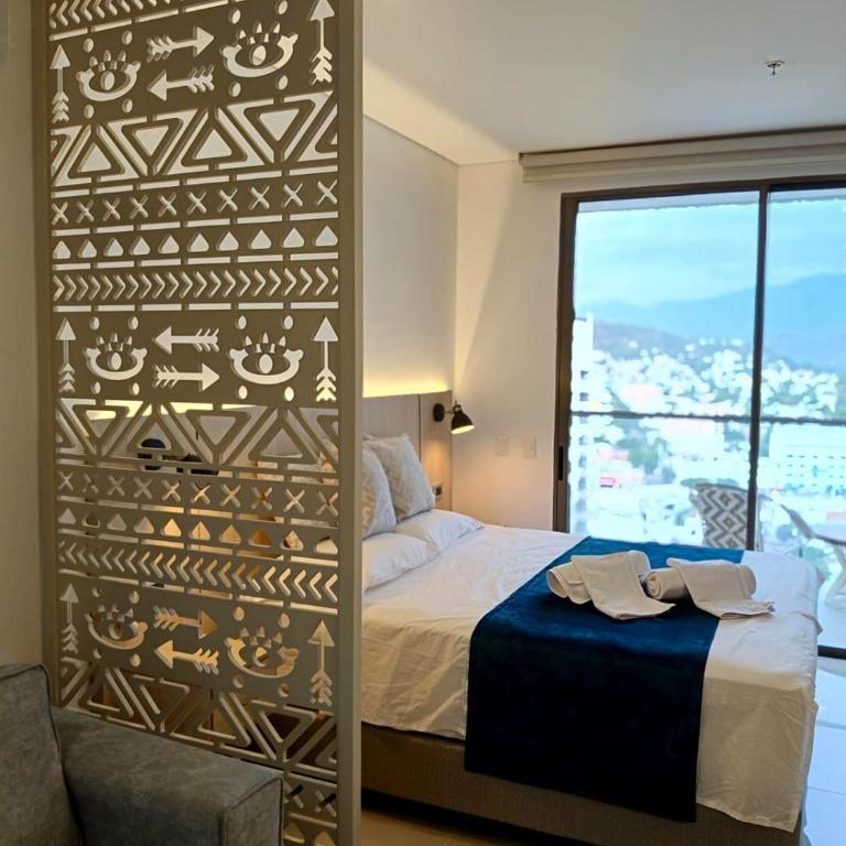 Loft Piso 13 - Vista a Sierra Nevada - Playa Salguero - One-Bedroom Apartment - 4