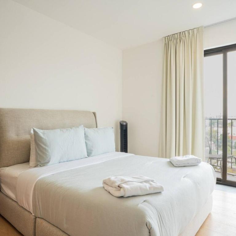 Luxury 2BR with Pool, Gym & Coworking - Appartement - 31