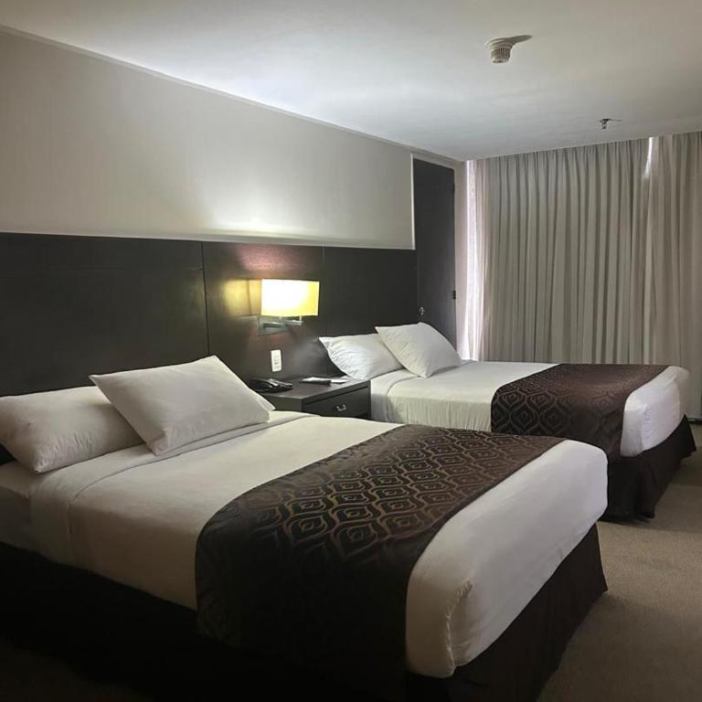 HOTEL CHACAO SUITES - Habitación Doble Deluxe - 2 camas - 6