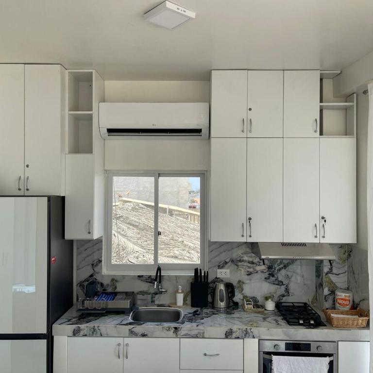 Sweet ocean view, steps from the beach - Two-Bedroom Apartment - 16