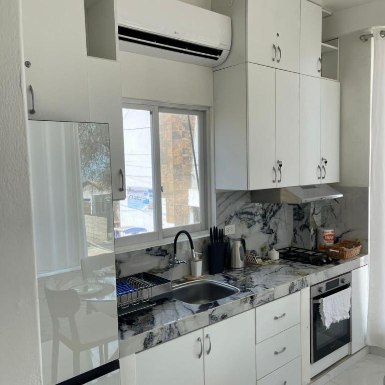 Sweet ocean view, steps from the beach - Two-Bedroom Apartment - 22