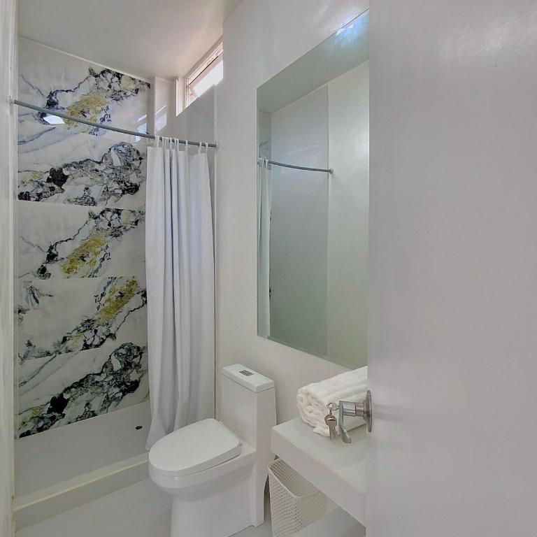 Sweet ocean view, steps from the beach - Two-Bedroom Apartment - 25