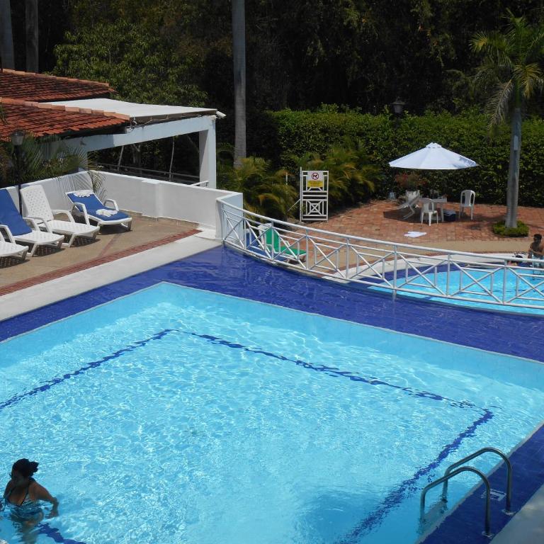 Condominio Girardot Resort Ap 6-402 Exclusivo Apartamento Turístico -Vista a las montañas -WiFi - Apartamento con vistas a la piscina - 42