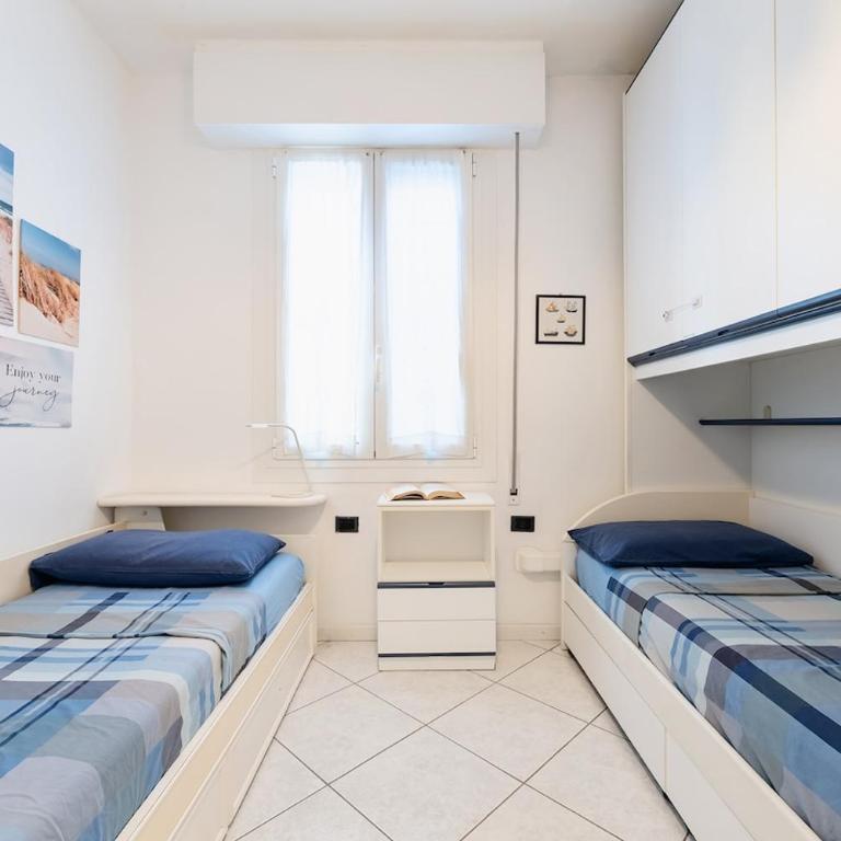 Relaxing Sea View Jesolo I Pool & Free Parking by Immobilux - Two-Bedroom Apartment - 4
