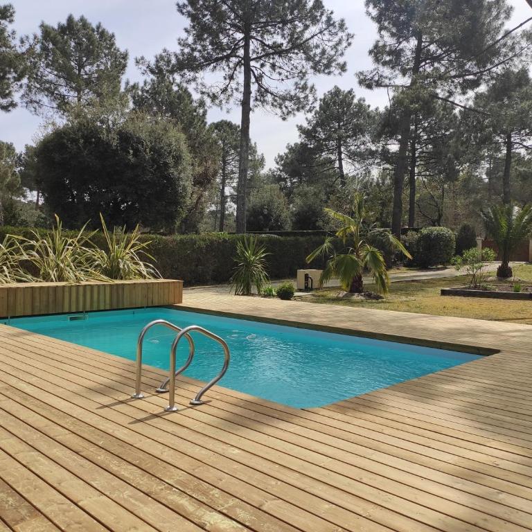 Le Bordelou- Villa de standing à Lacanau Océan, 6-8 pers, piscine chauffée, au calme, golf & surf - Three-Bedroom Villa - 1