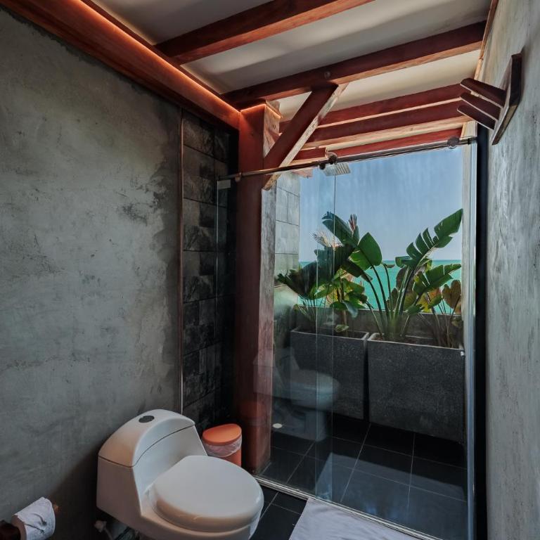 Jaguar Beachfront Ecohotel & Spa - Deluxe Suite with Sea View - 16
