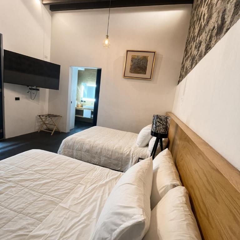 Casa Caballero y Osio - Habitación Doble - 2 camas - 3
