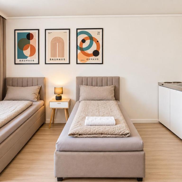 PrimeStay Appartementhaus - Zimmer für Lang und Kurzzeitaufenthalte - Camera Matrimoniale con Bagno in Comune - 1