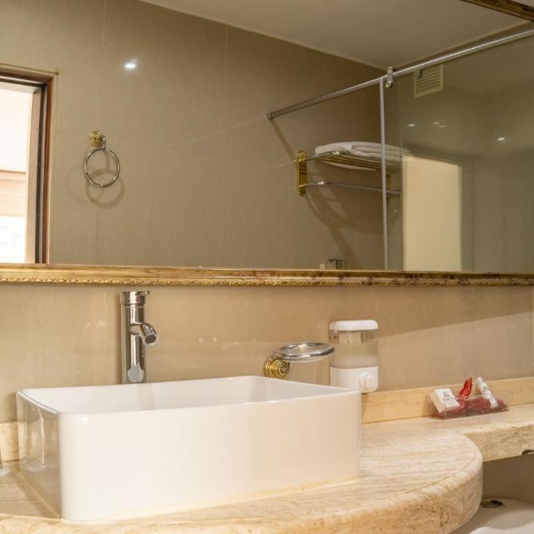 Richmond Suites Hotel - Suite con cama extragrande - 11