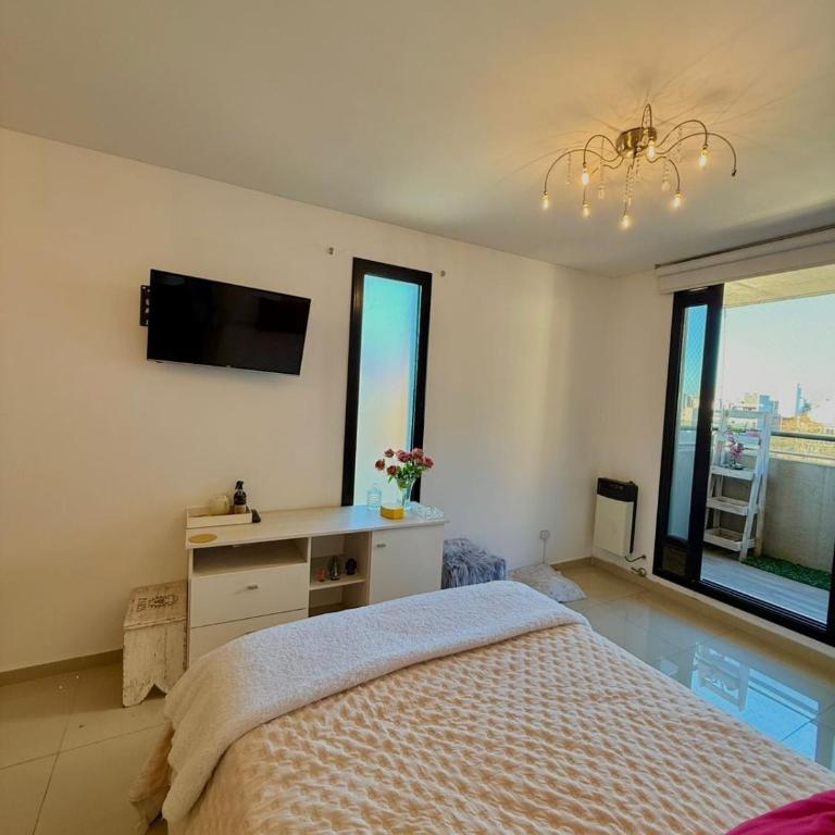 Monoambiente completo con balcón y piscina - Apartamento de 1 dormitorio - 10