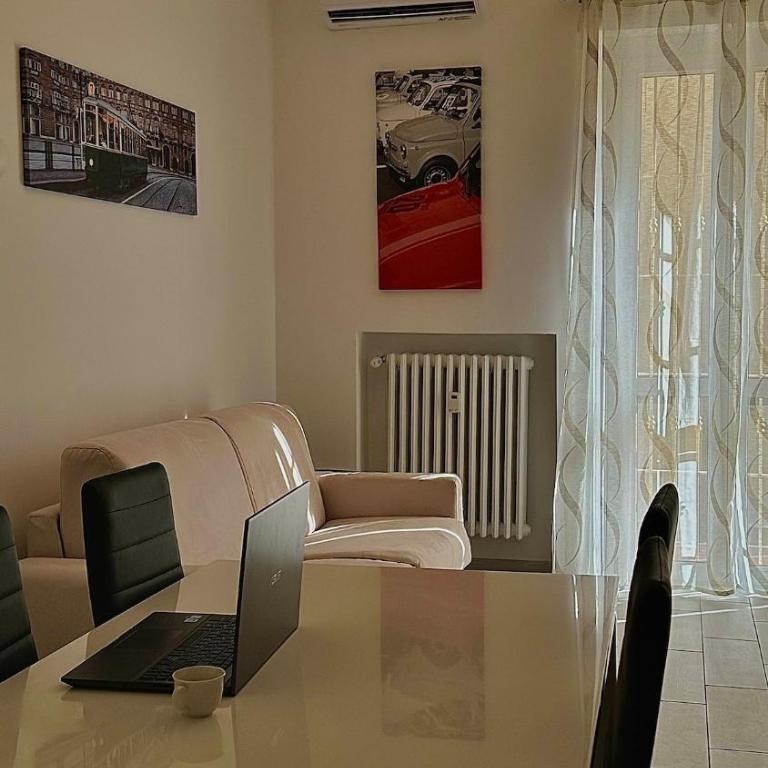 Bilocale,4 posti letto,2 bagni, parcheggio privato - Appartamento con 1 Camera da Letto - 4
