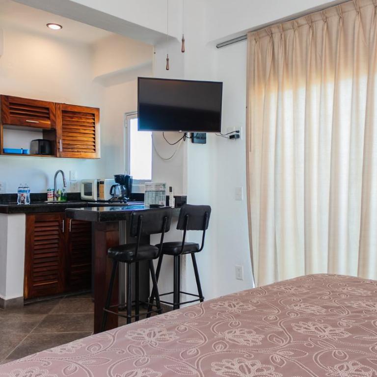 Hotel Suites Nadia Bucerias - Zimmer mit Queensize-Bett und Meerblick - 4