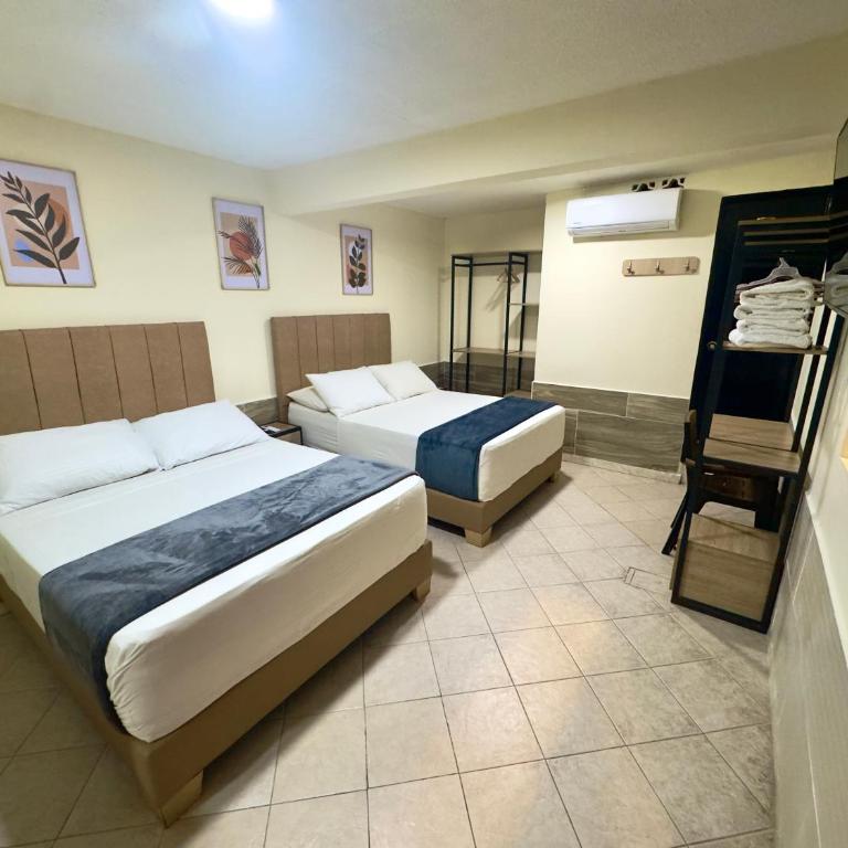 Hotel Estadio 80 - Habitación Cuádruple Deluxe - 1