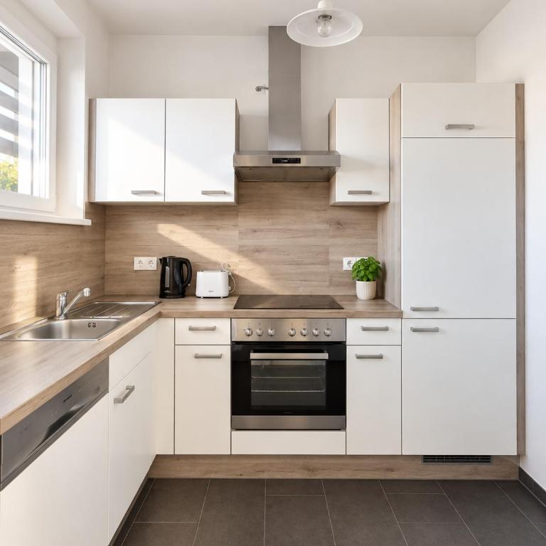 Urban Comfort mit Balkon und Tiefgarage - Apartment mit 1 Schlafzimmer - 4