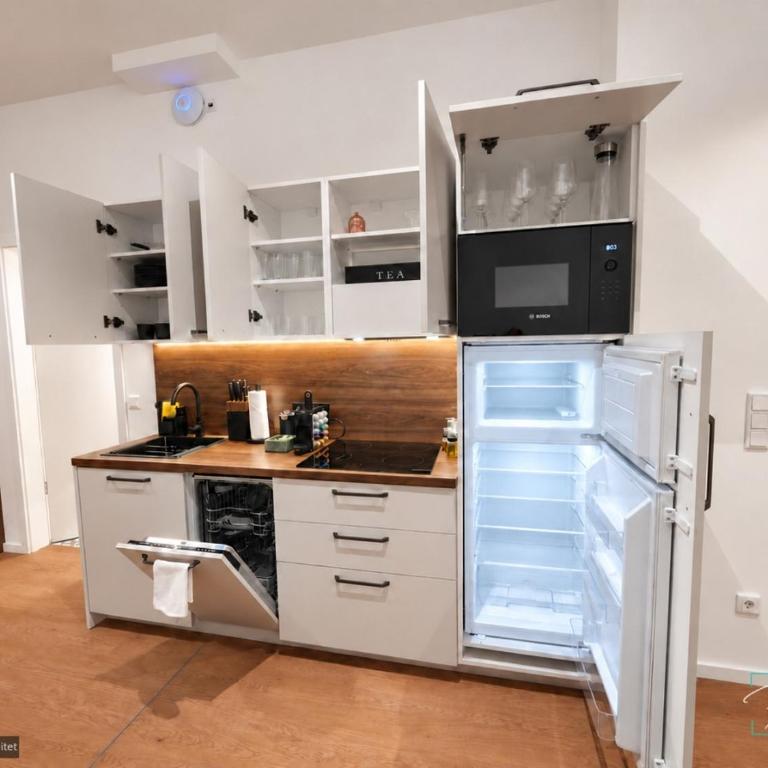 Homely Stay City Apartments - Studio mit Terrasse - 13