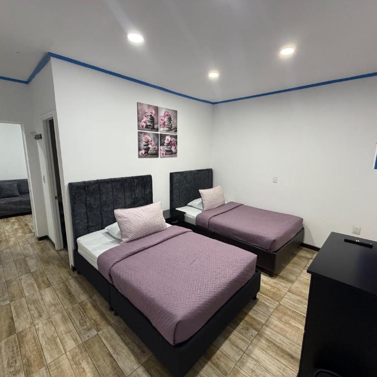 El Buen Descanso Hotel - Habitación cuádruple - 4