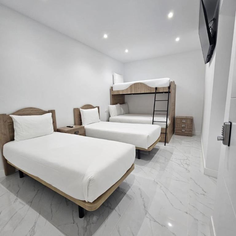 Nueva PENSION CIBELES - Standard Vierbettzimmer - 2