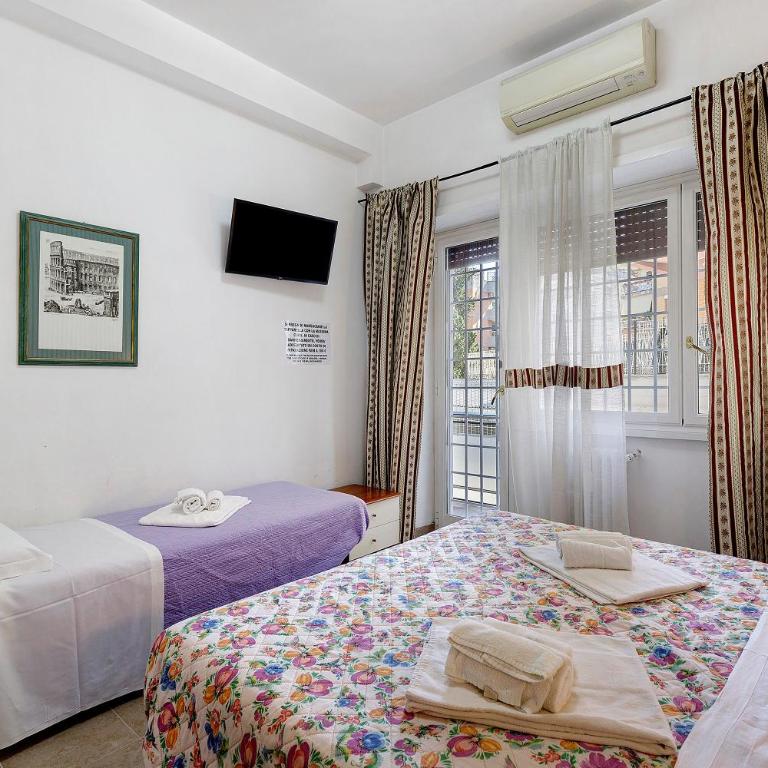 San Pietro House - Four-Bedroom Apartment with Balcony - 1