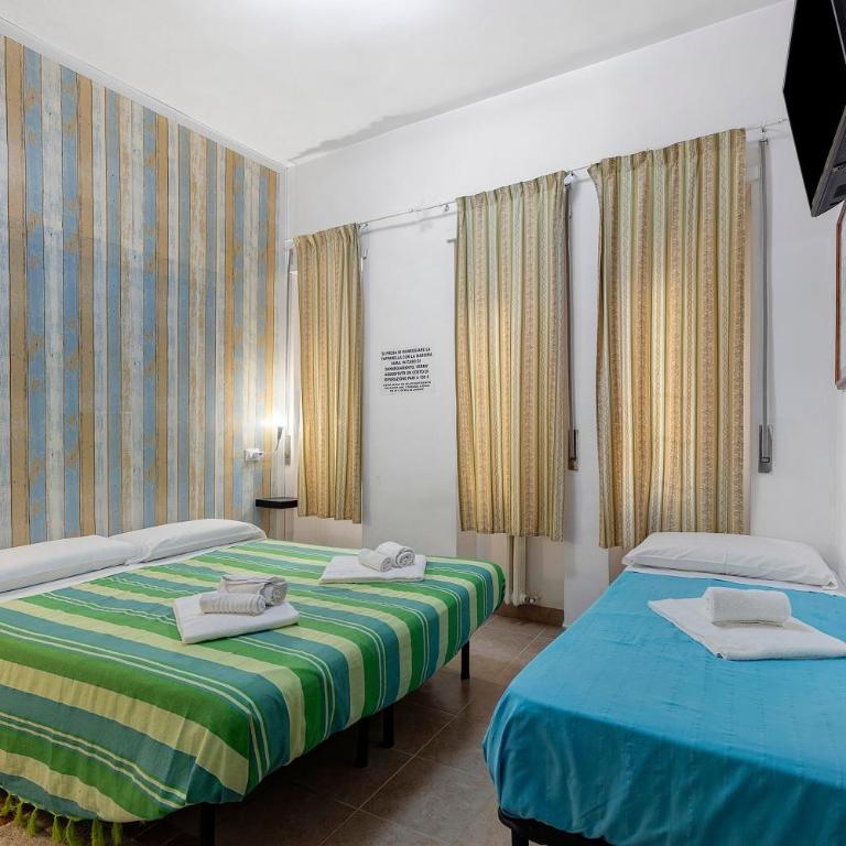 San Pietro House - Four-Bedroom Apartment with Balcony - 18